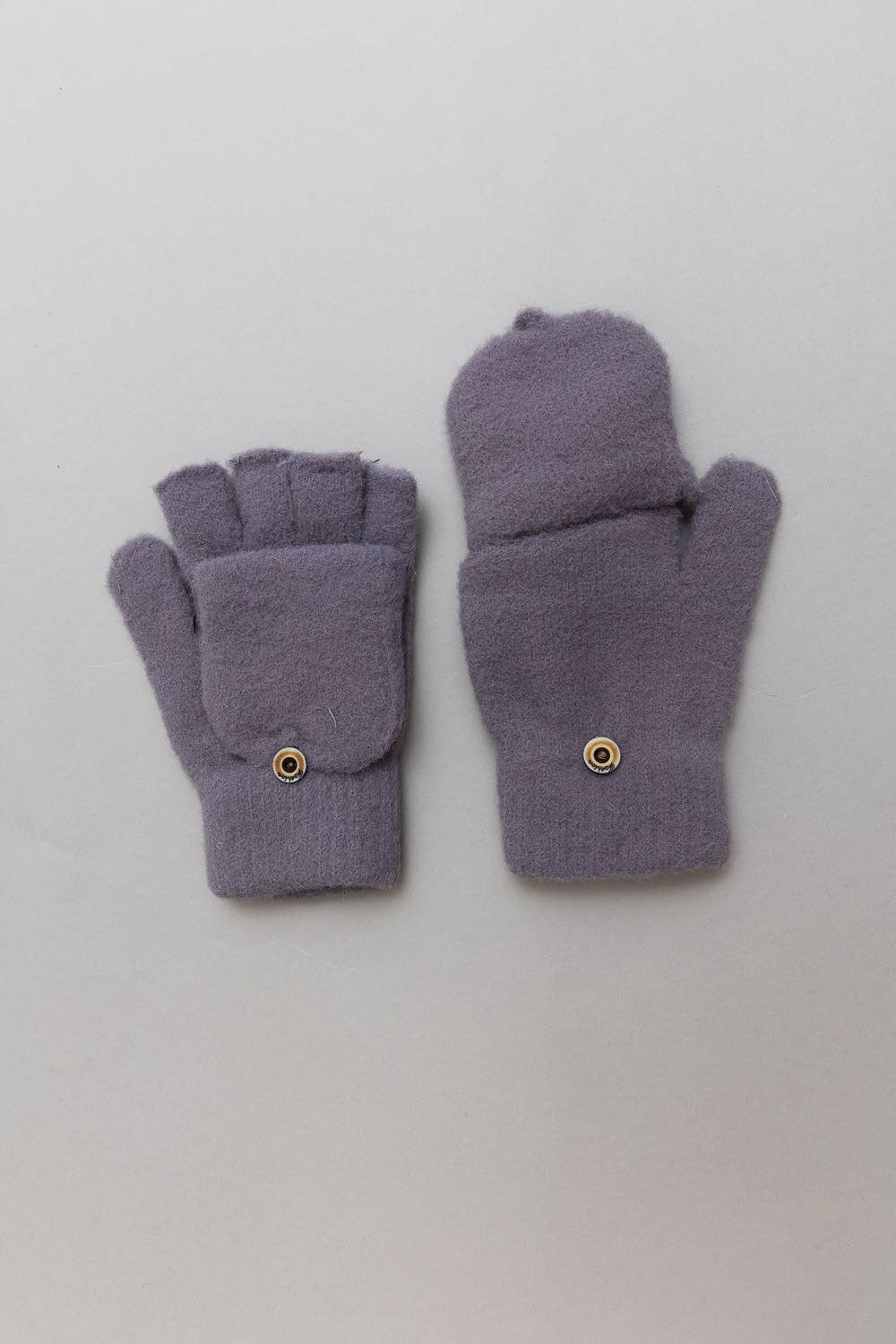 Pair of purple fingerless gloves with button closures convertible to mittens.  Fuzzy soft and comfortable. 